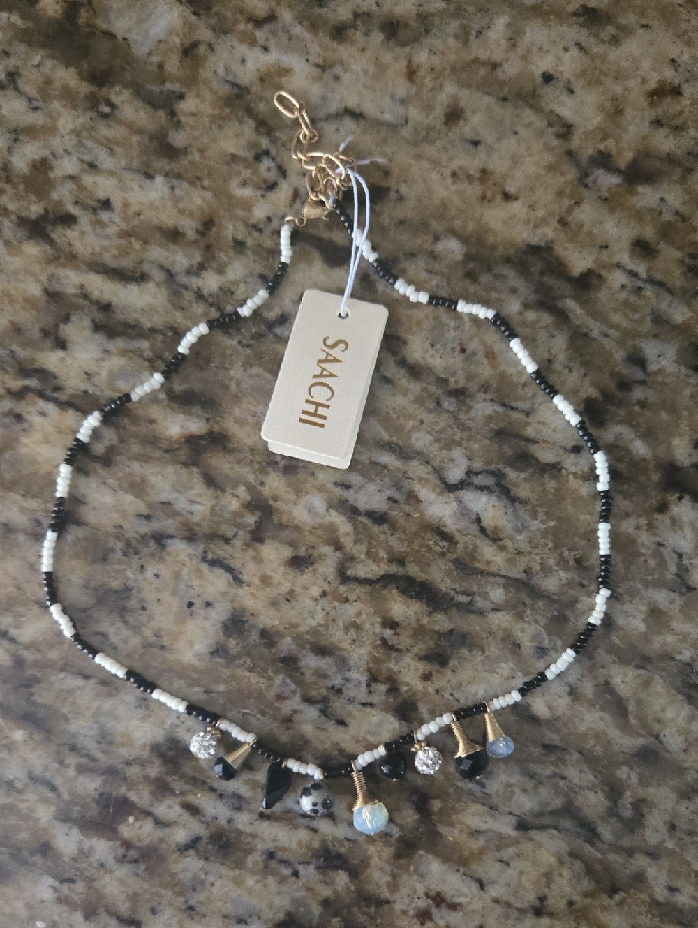 SAACHI Black and White Beaded Charm Necklace with Gold Accents